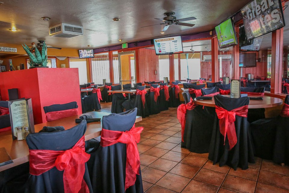 Casual dining room with tables and chairs.